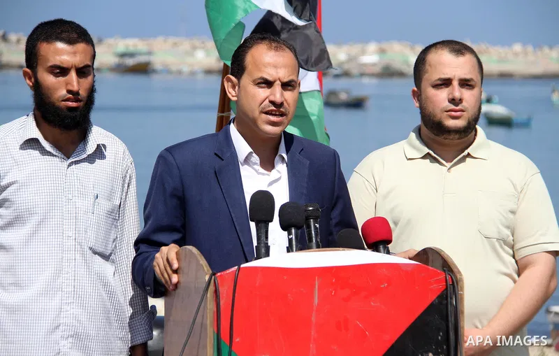 Spokesman of the National Commission to break the siege Bassam Al-Manasrah, speaks during a press conference at the seaport in Gaza city on September 16, 2018. Photo by Mahmoud Ajour