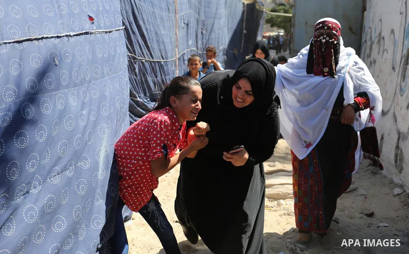 The sister of Palestinian Sohaib Abu Kashef, who died of wounds he sustained, during clashes in tents protest at the Israel-Gaza border, mourns during his funeral in Khan younis in the southern Gaza strip, on September 1...