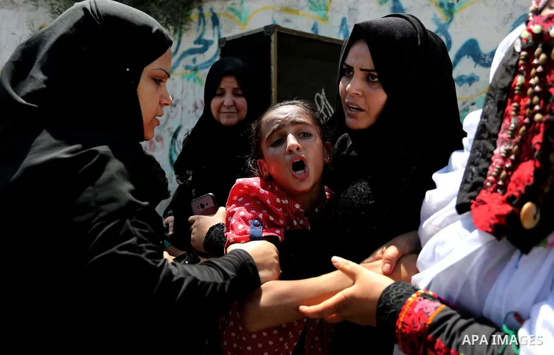 The sister of Palestinian Sohaib Abu Kashef, who died of wounds he sustained, during clashes in tents protest at the Israel-Gaza border, mourns during his funeral in Khan younis in the southern Gaza strip, on September 1...