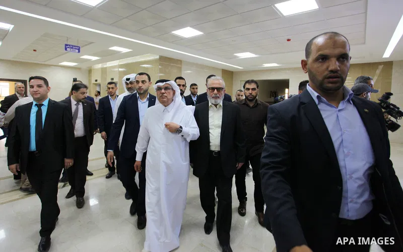 Qatar's Ambassador to the Palestinian Authority, Mohammed Al Emadi, attends the opening ceremony of new headquarters of the superior committee of justice, funded by Qatar in south of Gaza City on September 16, 2018. Phot...