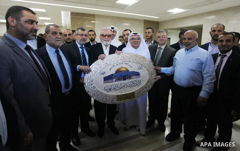Qatar's Ambassador to the Palestinian Authority, Mohammed Al Emadi, attends the opening ceremony of new headquarters of the superior committee of justice, funded by Qatar in south of Gaza City on September 16, 2018. Phot...