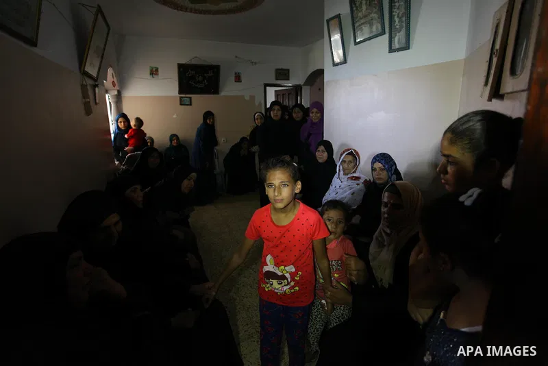 Relatives of Palestinian Mohamed Abu Nagy who was shot dead by Israeli troops during a demonstration against Israeli blockade on Gaza Strip, at the Erez crossing with Israel mourn during his funeral in Jabalia in the nor...