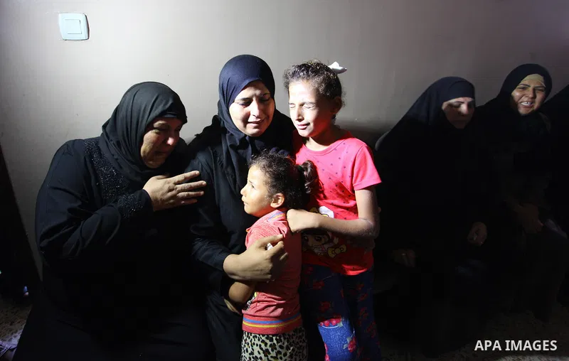 Relatives of Palestinian Mohamed Abu Nagy who was shot dead by Israeli troops during a demonstration against Israeli blockade on Gaza Strip, at the Erez crossing with Israel mourn during his funeral in Jabalia in the nor...