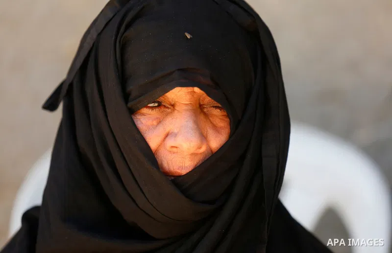 A relative of Palestinian Mo'men Abu Eyada 15, who was shot dead by Israeli troops during clashes in tents protest at the Israel-Gaza border, mourns during his funeral in Rafah in the southern Gaza Strip on September 20,...
