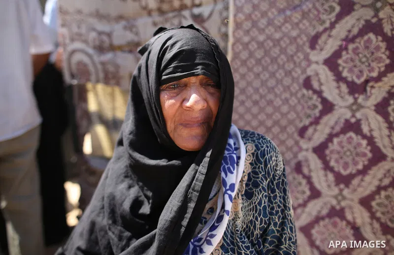 A relative of Palestinian Mo'men Abu Eyada 15, who was shot dead by Israeli troops during clashes in tents protest at the Israel-Gaza border, mourns during his funeral in Rafah in the southern Gaza Strip on September 20,...