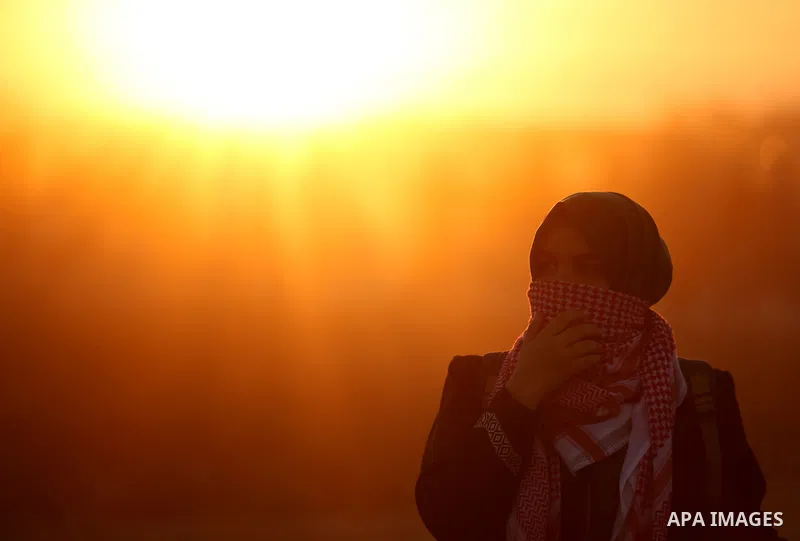 Palestinian protesters gather during clashes with Israeli troops in tents protest where Palestinians demand the right to return to their homeland at the Israel-Gaza border, in east of Gaza City on September 21, 2018. Pho...