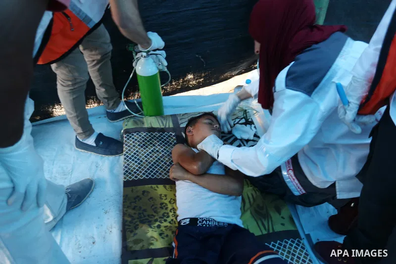 Wounded Palestinian protesters receive treatment in a medical tent during clashes with Israeli troops in tents protest where Palestinians demand the right to return to their homeland at the Israel-Gaza border, in Khan Yo...