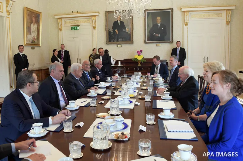 Palestinian President Mahmoud Abbas is welcomed by President of Ireland Michael D. Higgins and his wife Sabina Higgins at the Presidential Palace in Dublin, Ireland on September 22, 2018. Photo by Thaer Ganaim
