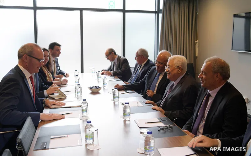 Palestinian President Mahmoud Abbas meets with Irish Foreign Minister in Dublin, Ireland on September 22, 2018. Photo by Thaer Ganaim