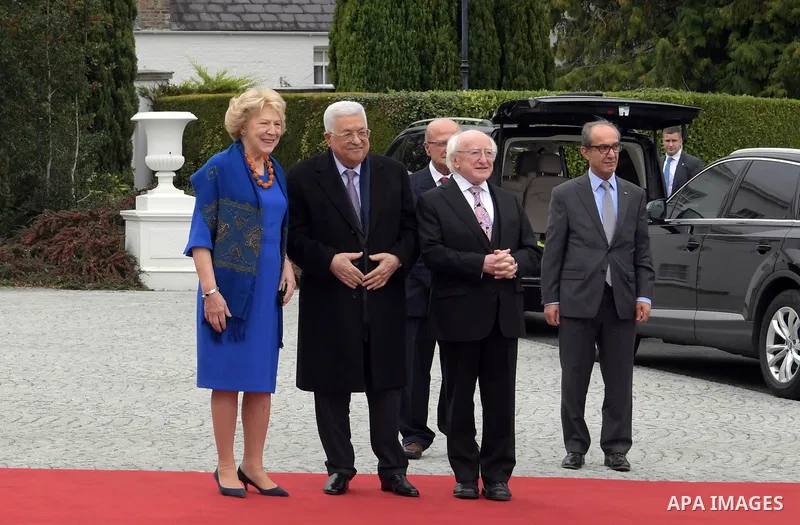Palestinian President Mahmoud Abbas is welcomed by President of Ireland Michael D. Higgins and his wife Sabina Higgins at the Presidential Palace in Dublin, Ireland on September 22, 2018. Photo by Thaer Ganaim