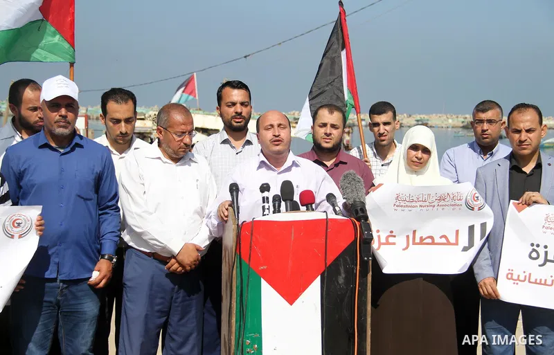 Palestinian members of the National Commission to break the siege, attend a press conference at the seaport in Gaza city on September 23, 2018. Photo by Mahmoud Ajour