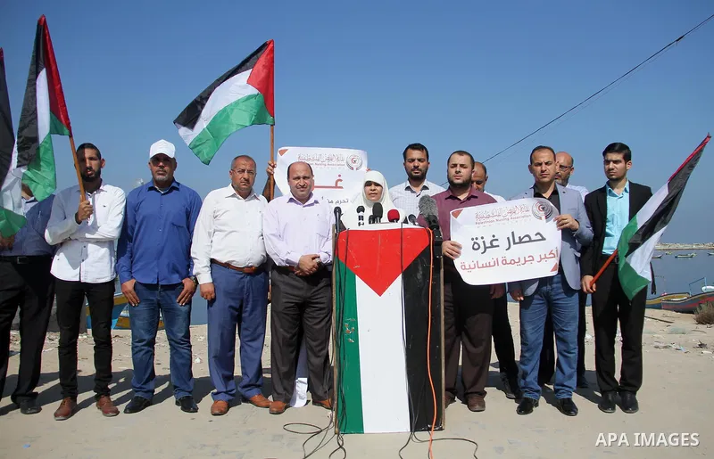 Palestinian members of the National Commission to break the siege, attend a press conference at the seaport in Gaza city on September 23, 2018. Photo by Mahmoud Ajour