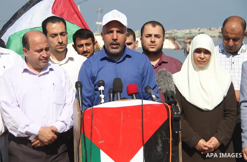 Palestinian members of the National Commission to break the siege, attend a press conference at the seaport in Gaza city on September 23, 2018. Photo by Mahmoud Ajour