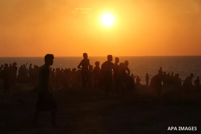 Palestinian protesters gather during clashes with Israeli forces in a demonstration against the Israeli blockade on Gaza Strip, along the Gaza sea barrier on the maritime border with Israel near Kibbutz Zikim, north of B...
