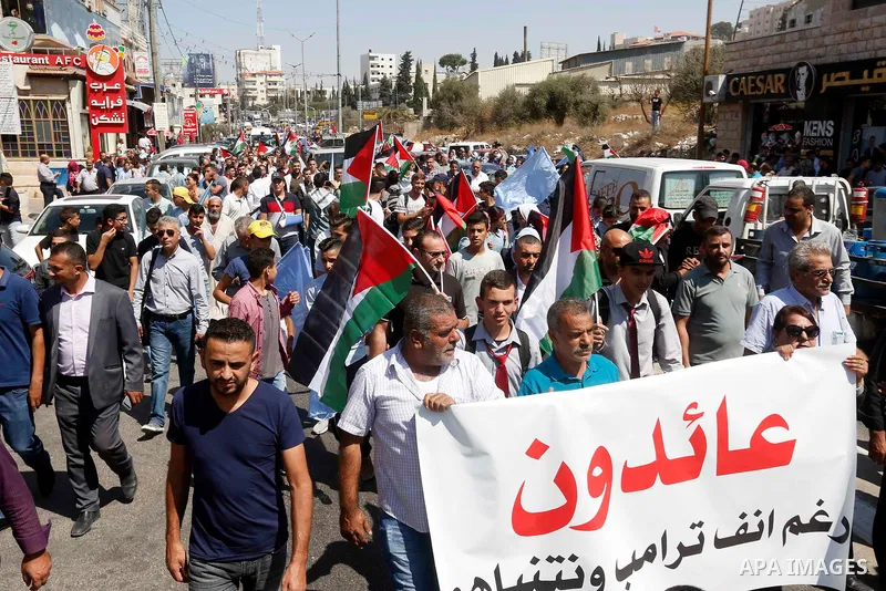 Palestinians take part during a protest against the United States decision earlier this year to stop funding and backing the United Nations Relief and Works Agency (UNRWA), in conjunction of the General Debate of the 73r...