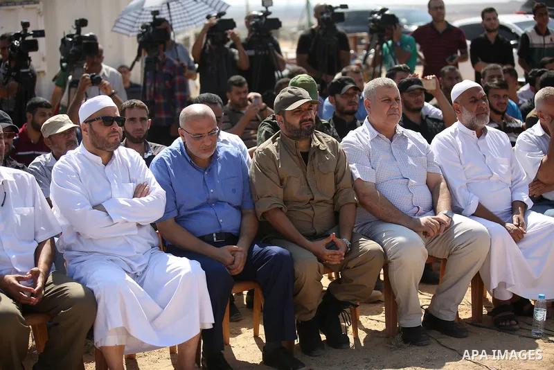 Members of the Islamic Jihad in Palestine attend a press conference to announce official result of the internal elections of the movement in Gaza strip at the Israel-Gaza border, in east of Gaza City on September 28, 201...