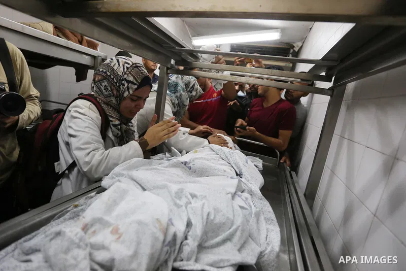 Relatives of Palestinian boy Nasser Musabah, 12, who was shot dead by Israeli forces during clashes in tents protest where Palestinians demand the right to return to their homeland at the Israel-Gaza border, mourn over h...
