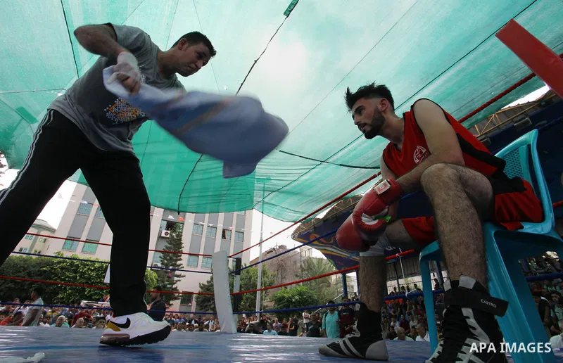 Palestinian fighters compete during the first individual boxing tournament at the University College of Applied Sciences "UCAS" in Gaza city, on September 30, 2018. Photo by Mahmoud Ajjour