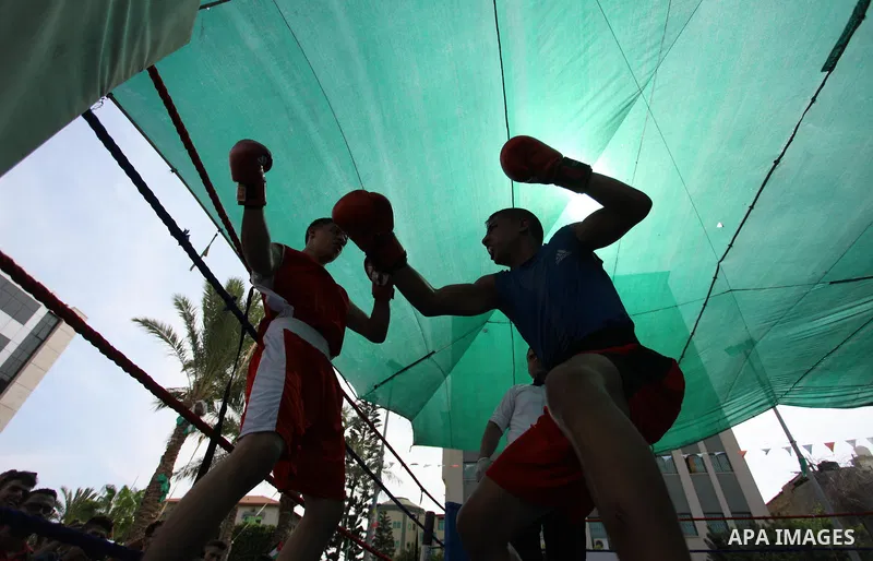 Palestinian fighters compete during the first individual boxing tournament at the University College of Applied Sciences "UCAS" in Gaza city, on September 30, 2018. Photo by Mahmoud Ajjour