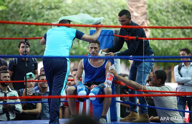 Palestinian fighters compete during the first individual boxing tournament at the University College of Applied Sciences "UCAS" in Gaza city, on September 30, 2018. Photo by Mahmoud Ajjour