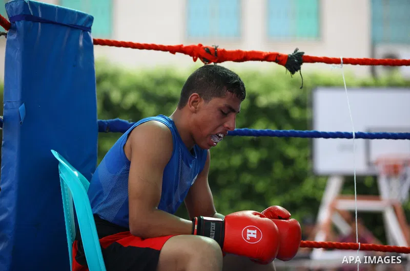 Palestinian fighters compete during the first individual boxing tournament at the University College of Applied Sciences "UCAS" in Gaza city, on September 30, 2018. Photo by Mahmoud Ajjour