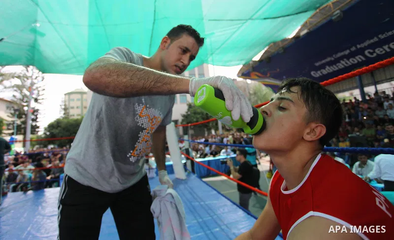 Palestinian fighters compete during the first individual boxing tournament at the University College of Applied Sciences "UCAS" in Gaza city, on September 30, 2018. Photo by Mahmoud Ajjour