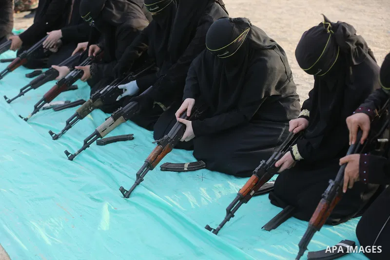 Palestinian Female members of al-Quds brigades, the military wing of Jihad Islamic organisation, Show their combat skills during a military show in Khan Yunis at southern Gaza Strip, on Oct. 6, 2018. Photo by Ashraf Amra
