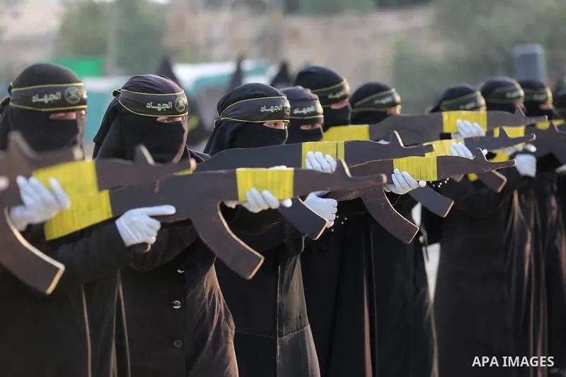 Palestinian Female members of al-Quds brigades, the military wing of Jihad Islamic organisation, Show their combat skills during a military show in Khan Yunis at southern Gaza Strip, on Oct. 6, 2018. Photo by Ashraf Amra