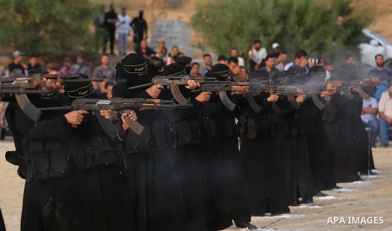 Palestinian Female members of al-Quds brigades, the military wing of Jihad Islamic organisation, Show their combat skills during a military show in Khan Yunis at southern Gaza Strip, on Oct. 6, 2018. Photo by Ashraf Amra
