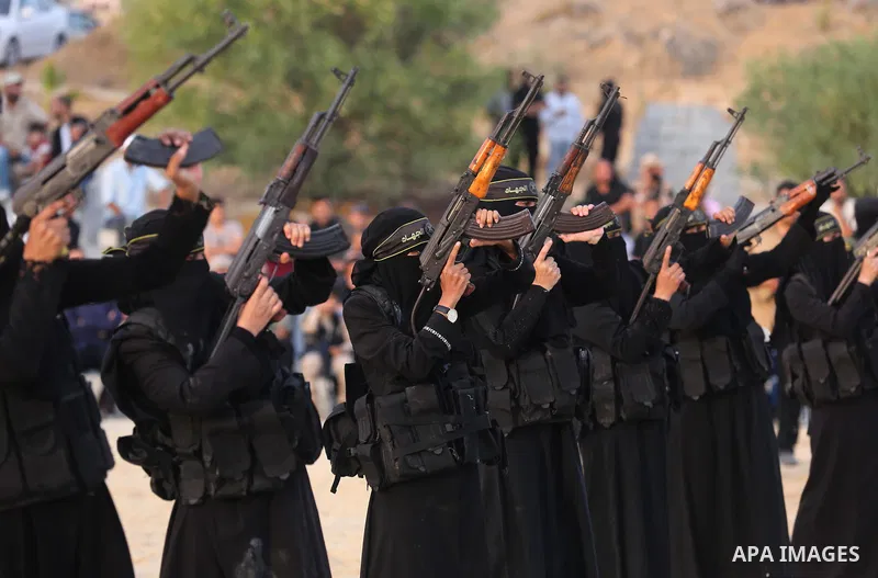 Palestinian Female members of al-Quds brigades, the military wing of Jihad Islamic organisation, Show their combat skills during a military show in Khan Yunis at southern Gaza Strip, on Oct. 6, 2018. Photo by Ashraf Amra