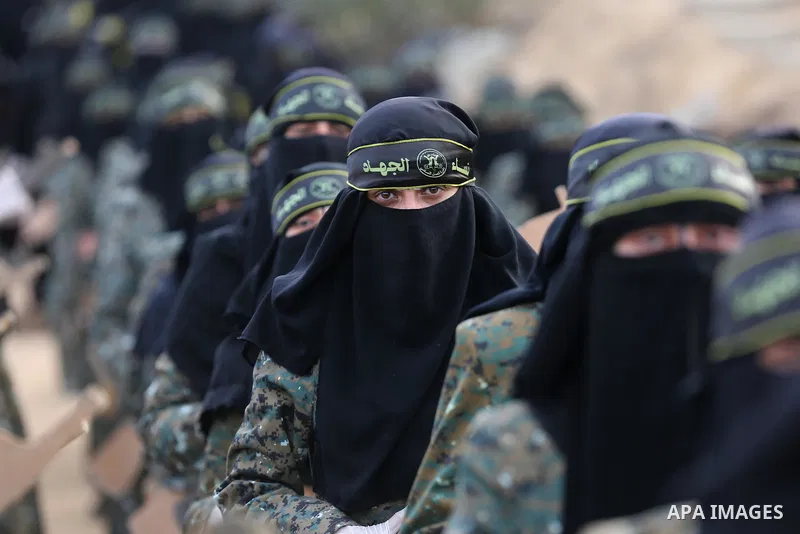 Palestinian Female members of al-Quds brigades, the military wing of Jihad Islamic organisation, Show their combat skills during a military show in Khan Yunis at southern Gaza Strip, on Oct. 6, 2018. Photo by Ashraf Amra