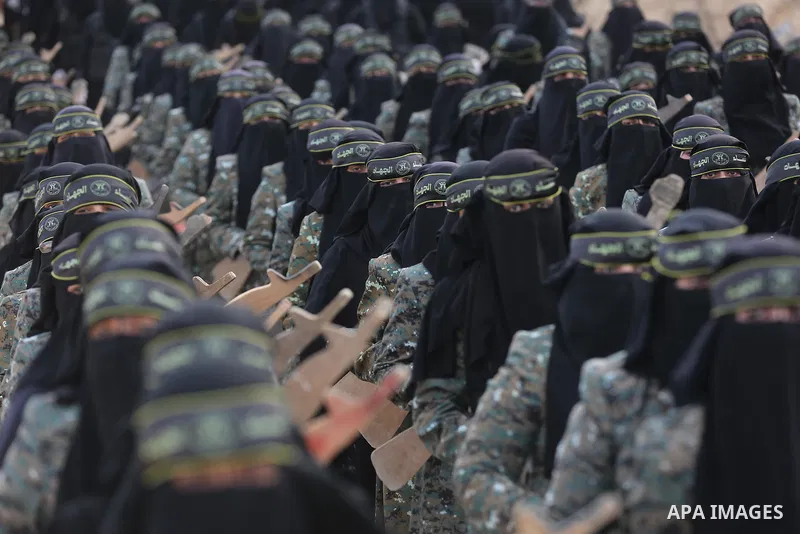Palestinian Female members of al-Quds brigades, the military wing of Jihad Islamic organisation, Show their combat skills during a military show in Khan Yunis at southern Gaza Strip, on Oct. 6, 2018. Photo by Ashraf Amra
