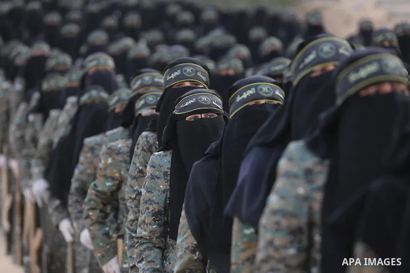 Palestinian Female members of al-Quds brigades, the military wing of Jihad Islamic organisation, Show their combat skills during a military show in Khan Yunis at southern Gaza Strip, on Oct. 6, 2018. Photo by Ashraf Amra