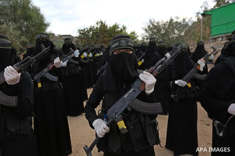 Palestinian Female members of al-Quds brigades, the military wing of Jihad Islamic organisation, Show their combat skills during a military show in Khan Yunis at southern Gaza Strip, on Oct. 6, 2018. Photo by Ashraf Amra