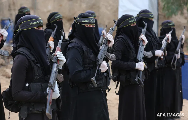 Palestinian Female members of al-Quds brigades, the military wing of Jihad Islamic organisation, Show their combat skills during a military show in Khan Yunis at southern Gaza Strip, on Oct. 6, 2018. Photo by Ashraf Amra