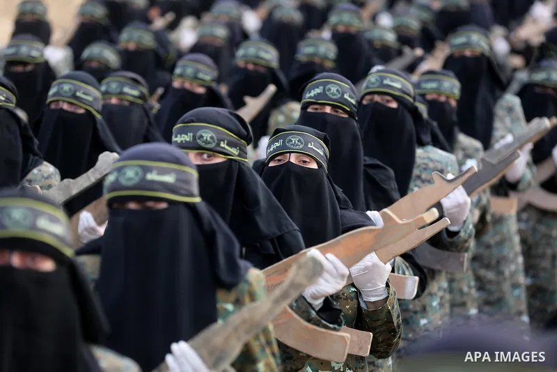 Palestinian Female members of al-Quds brigades, the military wing of Jihad Islamic organisation, Show their combat skills during a military show in Khan Yunis at southern Gaza Strip, on Oct. 6, 2018. Photo by Ashraf Amra