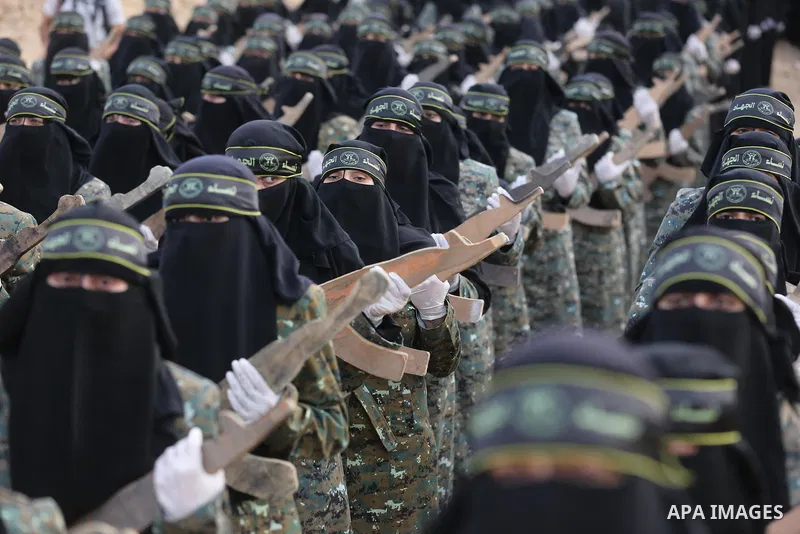 Palestinian Female members of al-Quds brigades, the military wing of Jihad Islamic organisation, Show their combat skills during a military show in Khan Yunis at southern Gaza Strip, on Oct. 6, 2018. Photo by Ashraf Amra