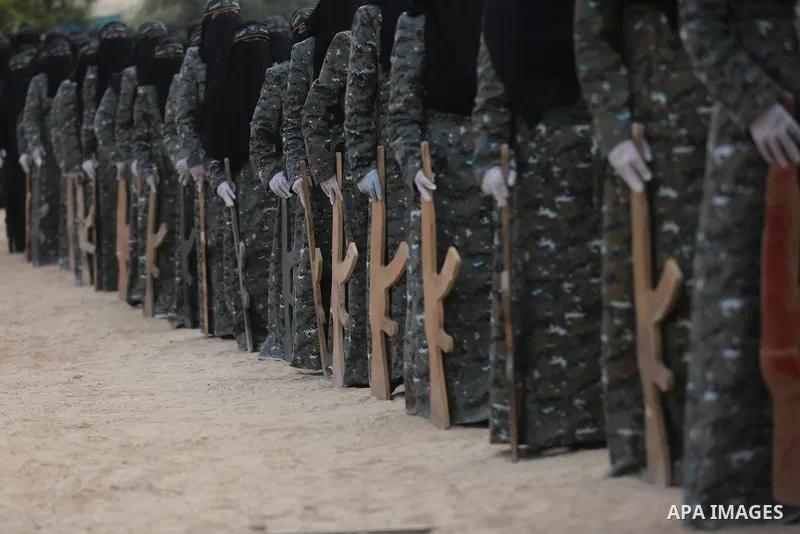 Palestinian Female members of al-Quds brigades, the military wing of Jihad Islamic organisation, Show their combat skills during a military show in Khan Yunis at southern Gaza Strip, on Oct. 6, 2018. Photo by Ashraf Amra
