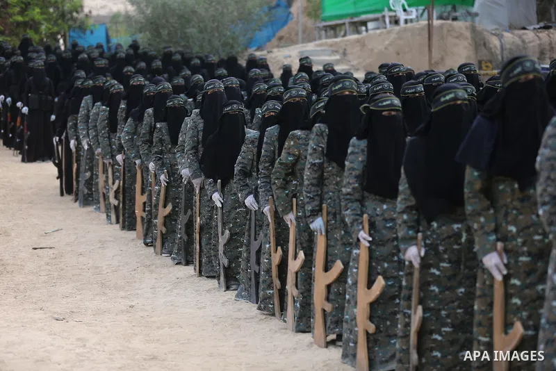 Palestinian Female members of al-Quds brigades, the military wing of Jihad Islamic organisation, Show their combat skills during a military show in Khan Yunis at southern Gaza Strip, on Oct. 6, 2018. Photo by Ashraf Amra