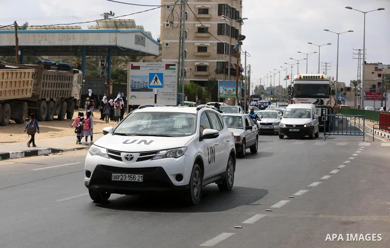 A United Nations vehicle follows a fuel tanker as it arrives at Gaza's power plant in Nuseirat in the central Gaza Strip, on October 9, 2018. Trucks carrying Qatari-bought fuel entered the Gaza Strip on October 9 to help...