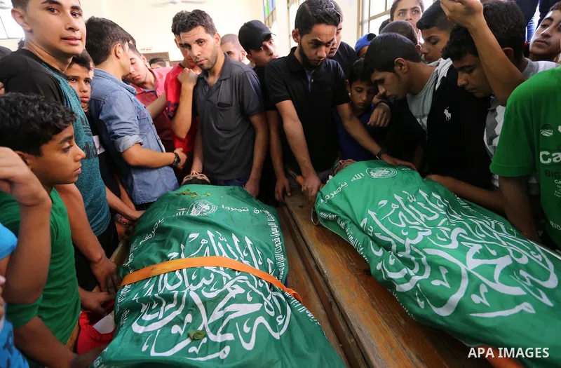Relatives of Palestinians Ahmed al-Tawil, 27, and Ahmed Abu Naim, 17, who were shot dead by Israeli troops during clashes in tents protest where Palestinian demand rights to return to their homeland at Israel-Gaza border...
