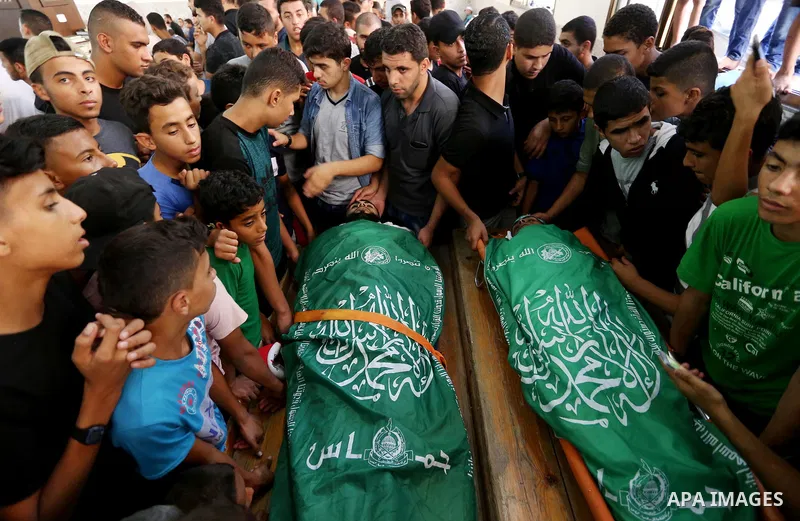 Relatives of Palestinians Ahmed al-Tawil, 27, and Ahmed Abu Naim, 17, who were shot dead by Israeli troops during clashes in tents protest where Palestinian demand rights to return to their homeland at Israel-Gaza border...