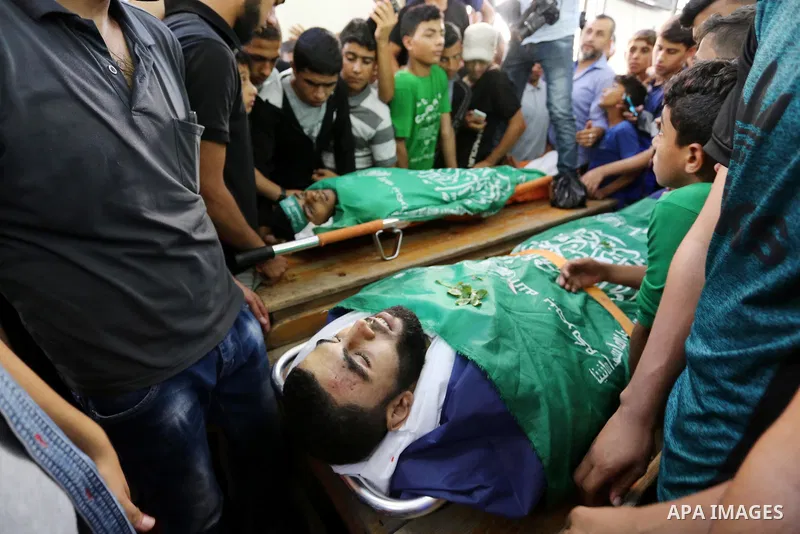 Relatives of Palestinians Ahmed al-Tawil, 27, and Ahmed Abu Naim, 17, who were shot dead by Israeli troops during clashes in tents protest where Palestinian demand rights to return to their homeland at Israel-Gaza border...