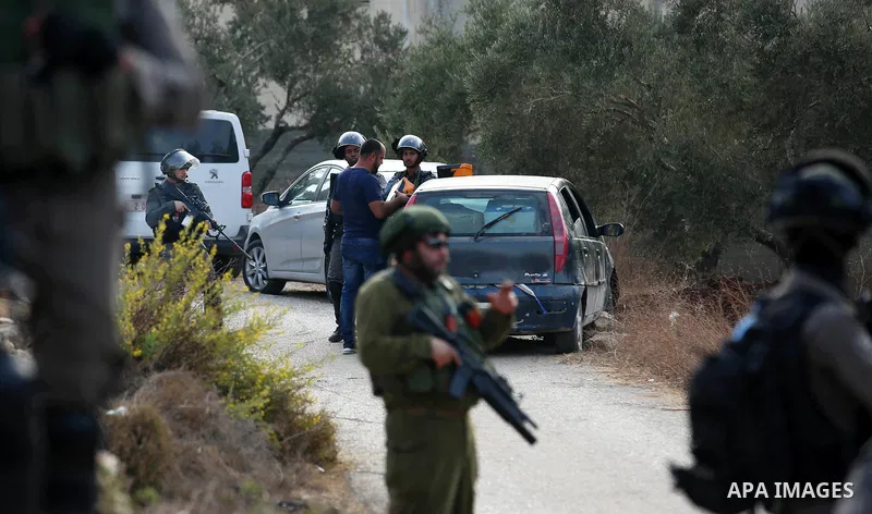 Israeli soldiers take position during clashes with Palestinian order to shut down a Palestinian school in the West Bank city of Nablus, on October 15, 2018. Photo by Shadi Jarar'ah