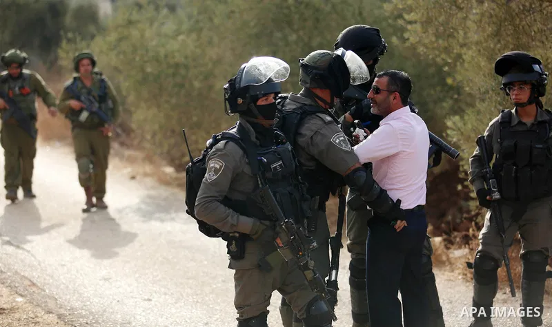 Palestinians clash with Israeli soldiers over an Israeli order to shut down a Palestinian school in the West Bank city of Nablus, on October 15, 2018. Photo by Shadi Jarar'ah