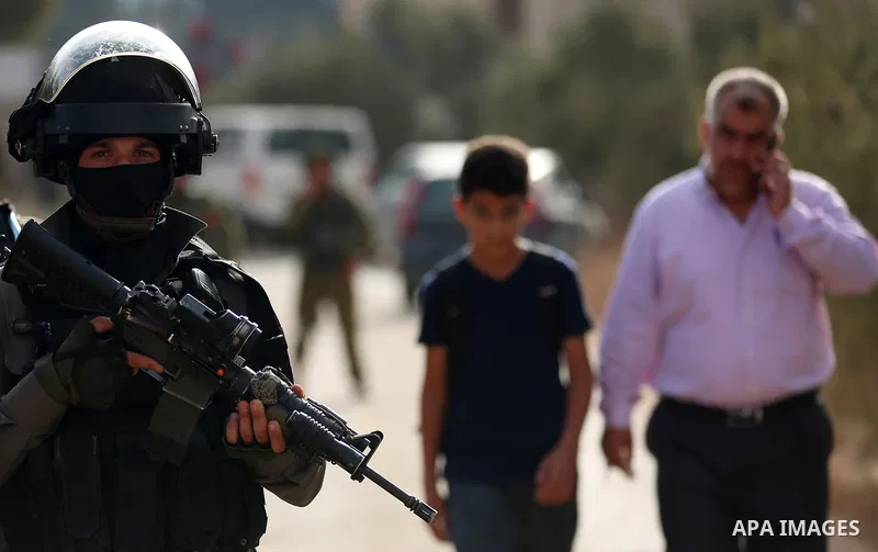 Palestinians clash with Israeli soldiers over an Israeli order to shut down a Palestinian school in the West Bank city of Nablus, on October 15, 2018. Photo by Shadi Jarar'ah
