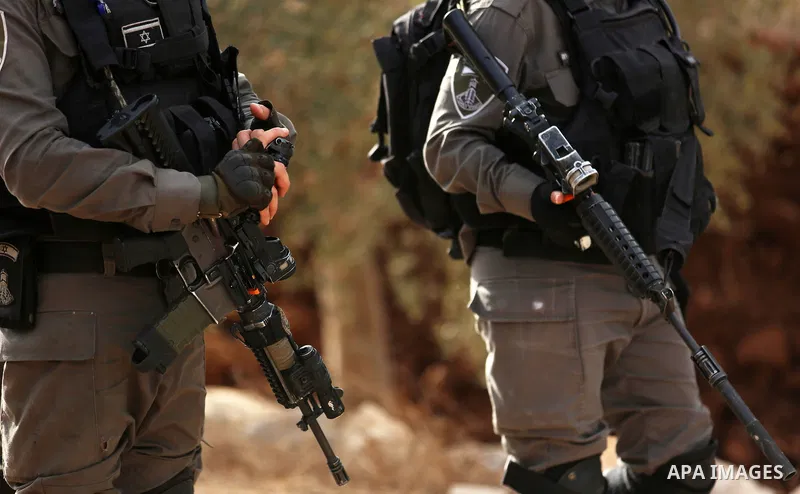 Israeli soldiers take position during clashes with Palestinian order to shut down a Palestinian school in the West Bank city of Nablus, on October 15, 2018. Photo by Shadi Jarar'ah