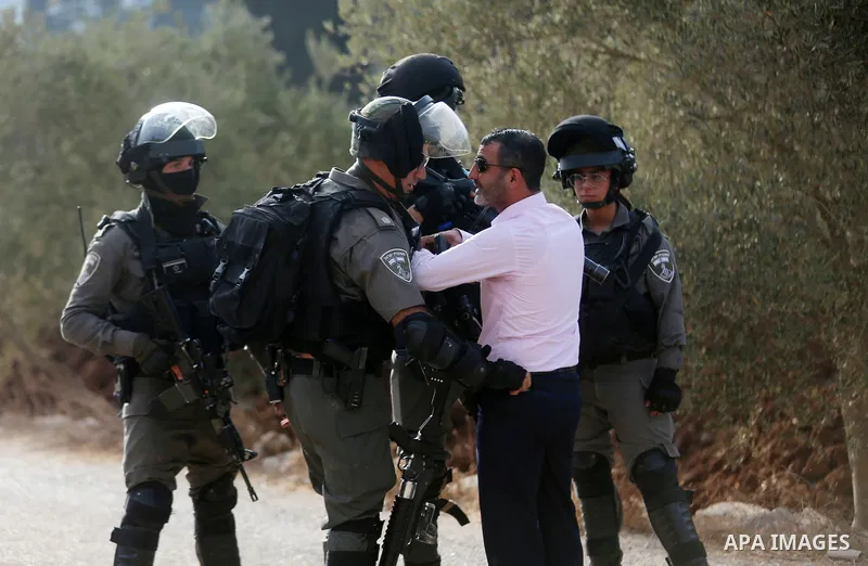 Palestinians clash with Israeli soldiers over an Israeli order to shut down a Palestinian school in the West Bank city of Nablus, on October 15, 2018. Photo by Shadi Hatem