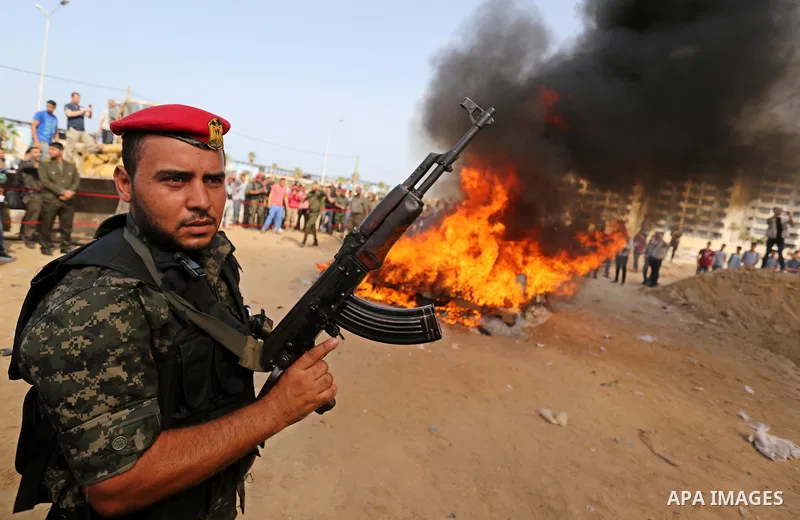 Members of Palestinian anti-drug police burn drugs during the annual conference for the destruction of narcotics, in Gaza City on October 22, 2018. Photo by Ashraf Amra