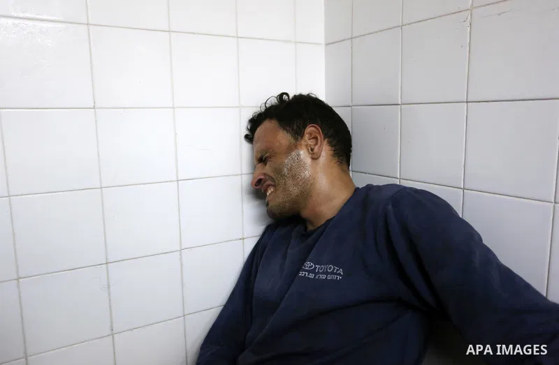 Relatives of Palestinians who were shot dead by Israeli forces during clashes with Israeli troops in tents protest where Palestinians demand the right to return to their homeland at the Israel-Gaza border, mourn in a hos...